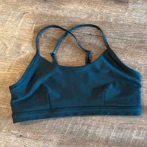 Alo airlift intrigue sports bra in midnight green